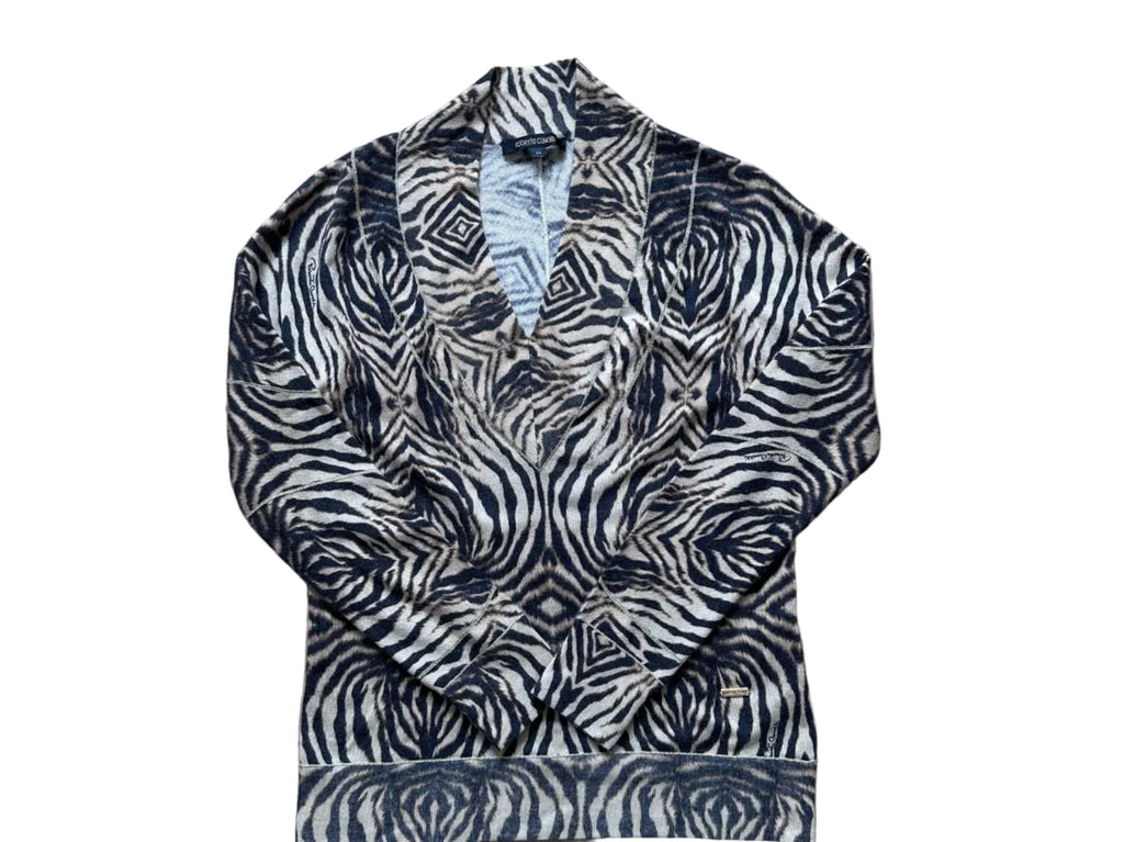 Zebra print Roberto Cavalli Y2K sweater patterned fabric on a wooden floor