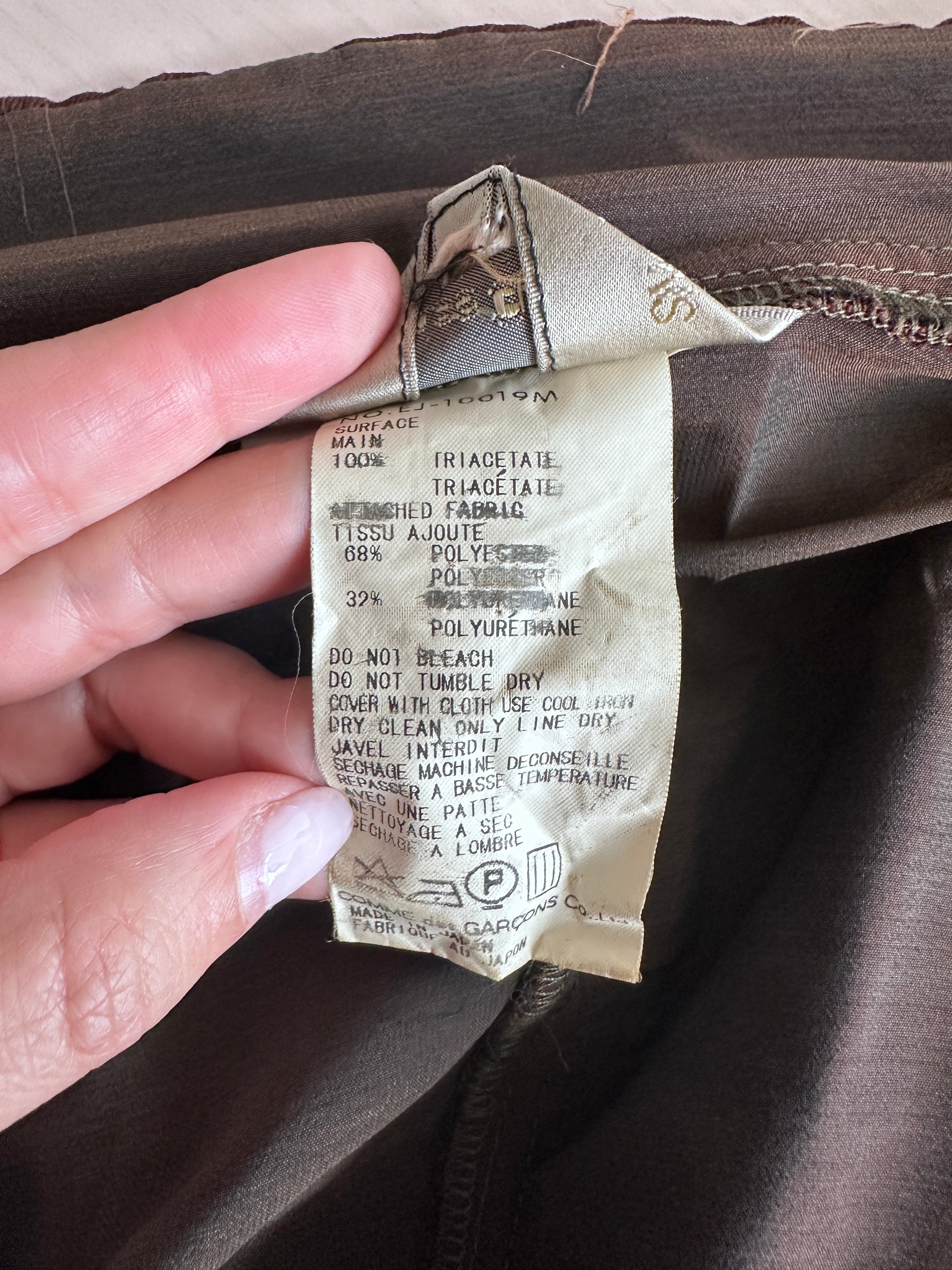 Comme des Garçons “Coercion” Utility Jacket